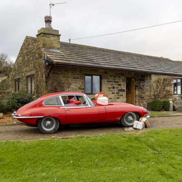 Father Christmas arrives at Higher Scholes Cottage, Haworth